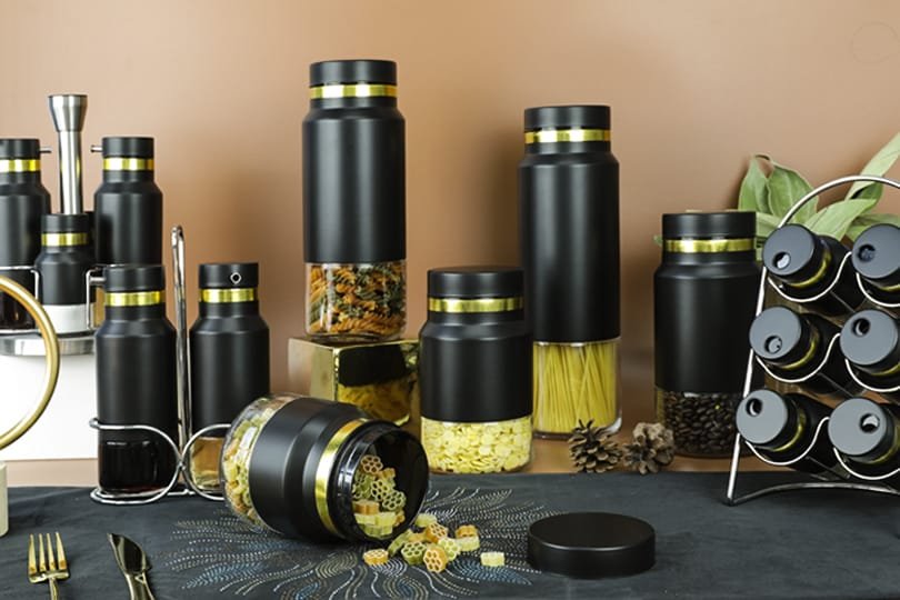 Aelga combines clear glass with solid stainless steel in many of her products.
